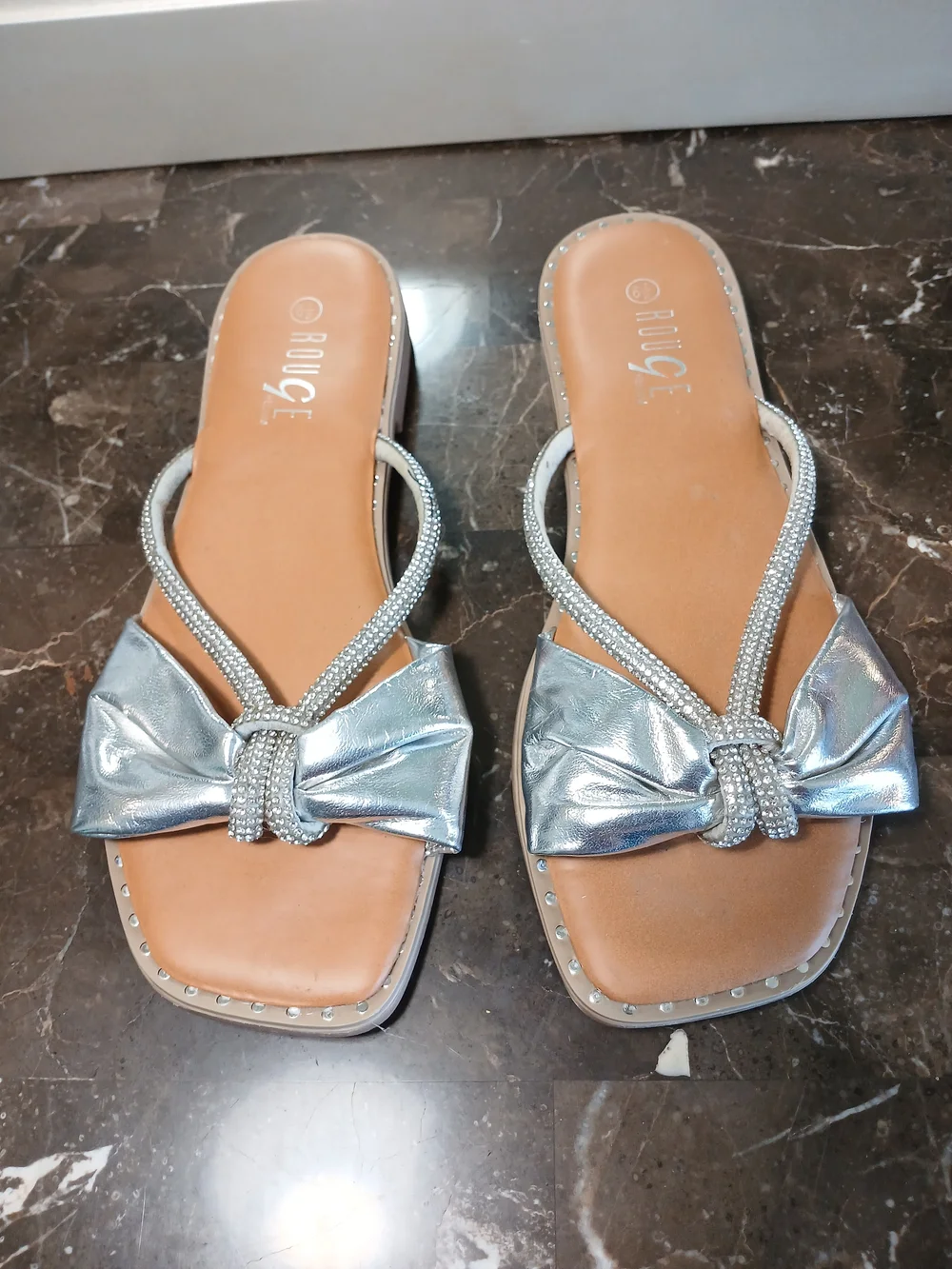 Rouge Helium Silver Bow Slide Sandals - Women's Metallic Slip-On